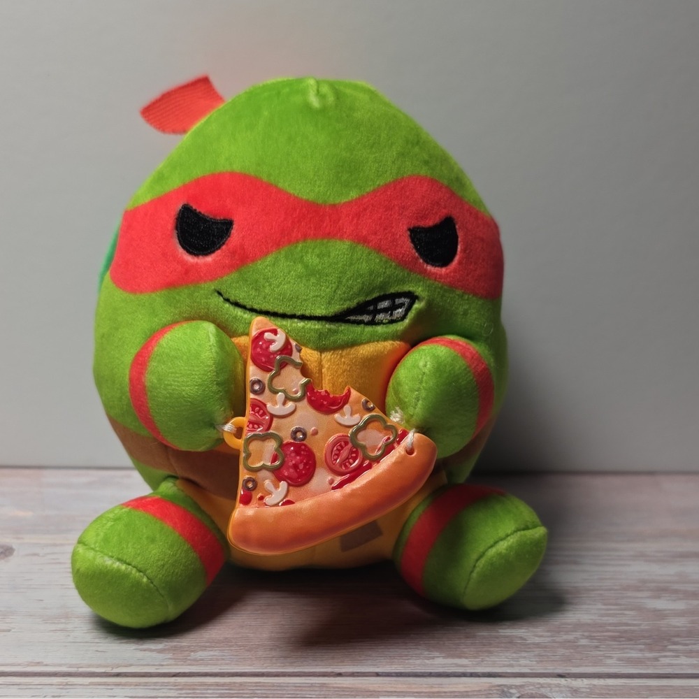 ZURU TMNT Raphael Green Turtle Plush Holding Pizza Slice Surface Washable 2024